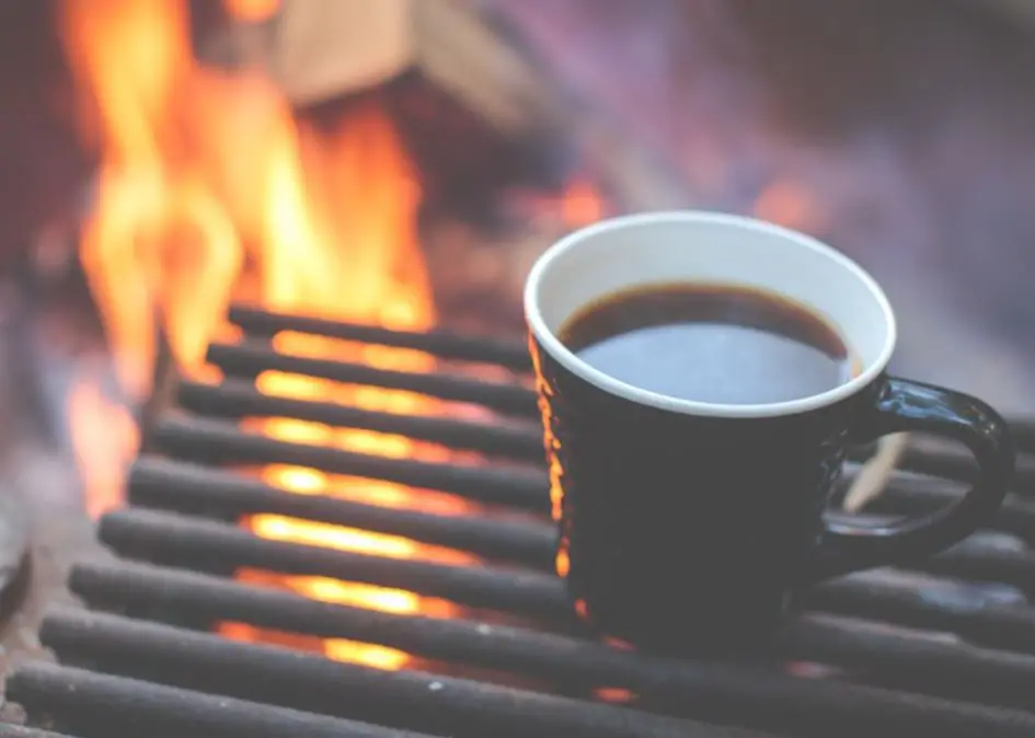 Having Warm Drinks While Camping is a great way to keep warm in a tent without electricity