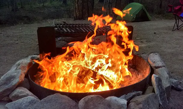 how to keep a fire pit going all night