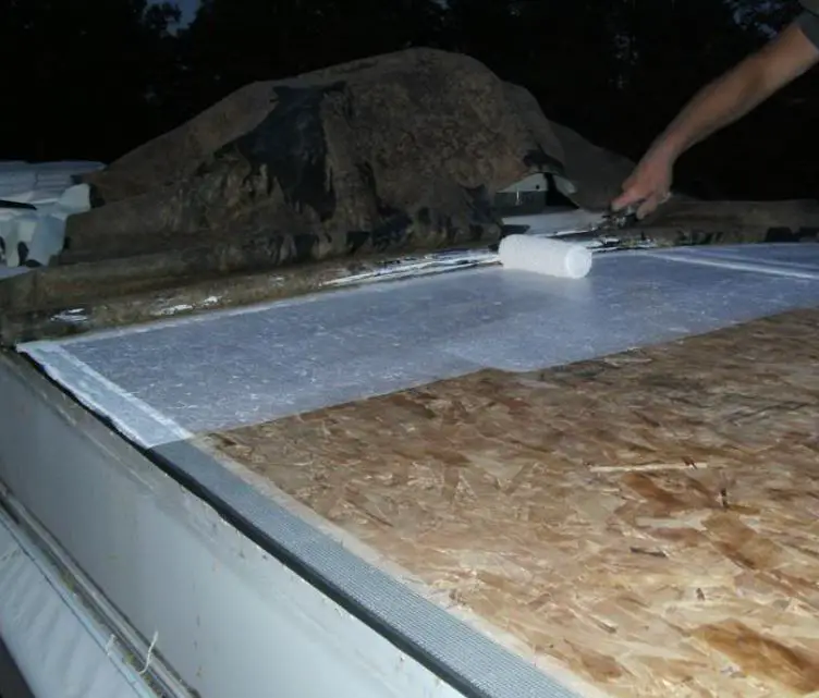 rv roof repair applying sealant