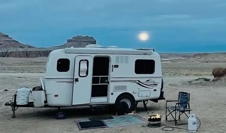 off-grid camping on the beach in a camper
