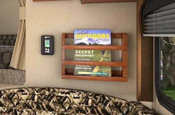 rv magazine rack hanging on rv wall