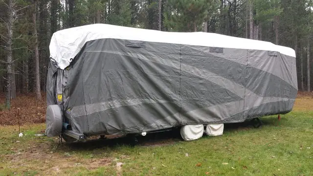 covered rv with tire covers