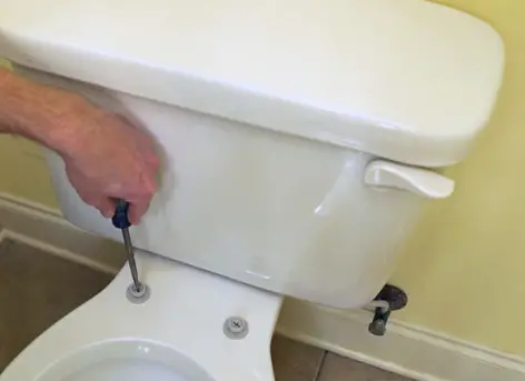 fixing a toilet