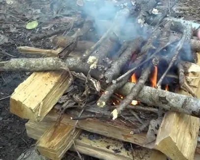 log cabin campfire structure
