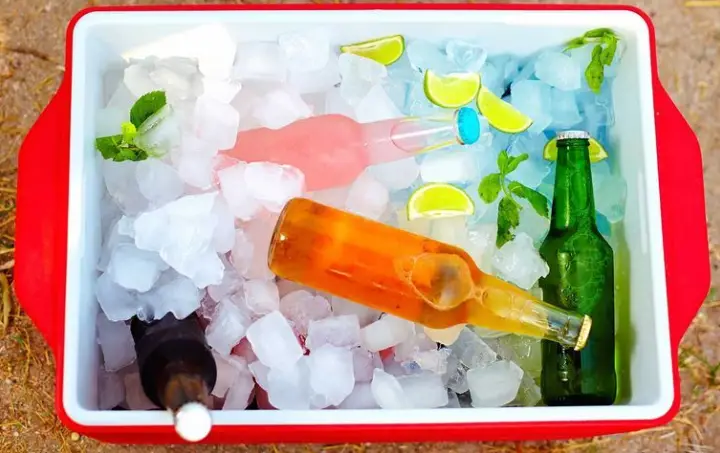 packed cooler with soda bottles