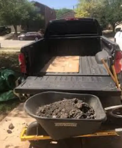 putting dirt in truck bed